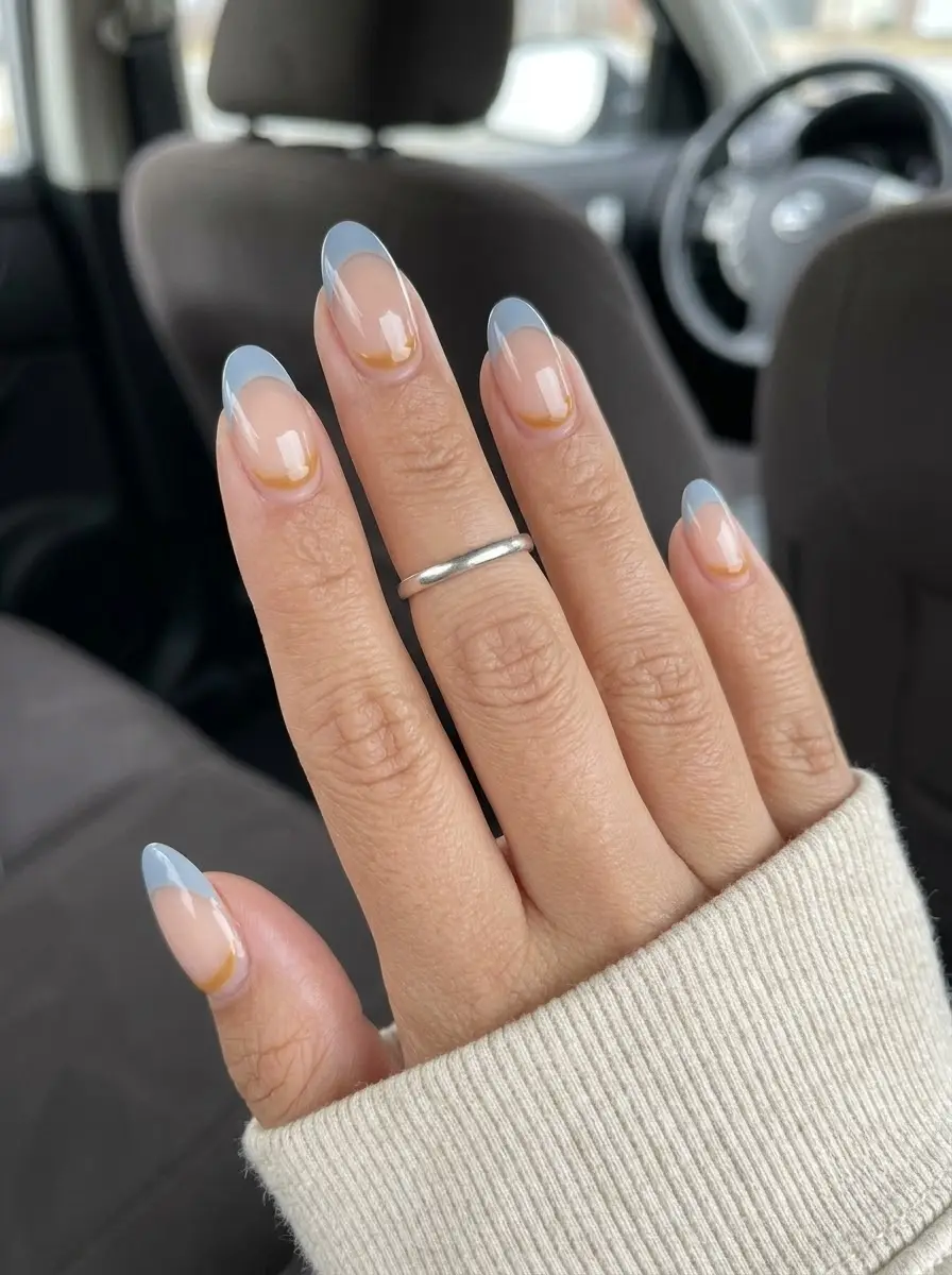 Pale Blue French Tips with Golden Half-Moon Accents