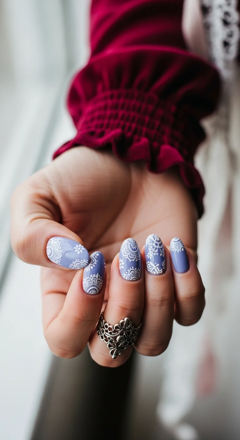 Lavender nails with white lace/mandala stamping.